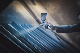 Metal parts sprayed with a surface finish
