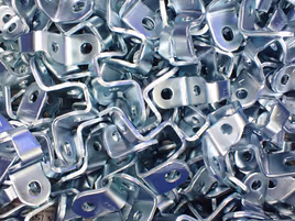 Pile of metal die cast hinges