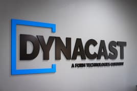 Dynacast logo on a wall in the Elgin plant