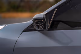 Safety camera on a car mirror